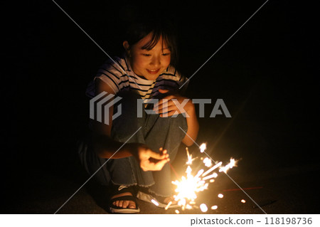 Girls making fireworks Girls making fireworks 118198736