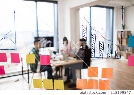 Business meeting with data analysis on glass board Business meeting with data analysis on glass board 118199847