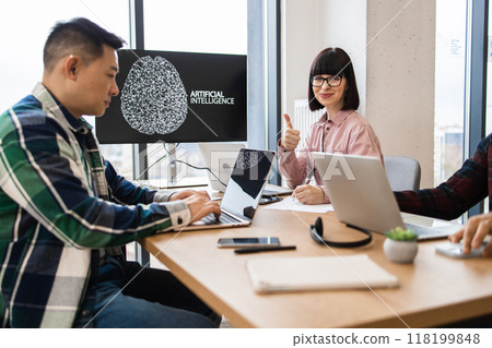 IT experts collaborating on artificial intelligence development 118199848