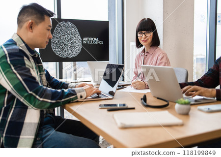 IT experts working on artificial intelligence development in modern office IT experts working on artificial intelligence development in modern office 118199849