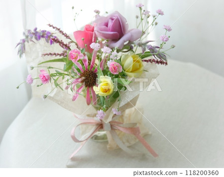 Miniature rose arrangement on a window table 118200360