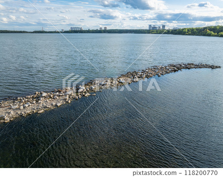 Aerial view of lake or river green shore with forest. Summer season. Aerial view of lake or river green shore with forest. Summer season. 118200770