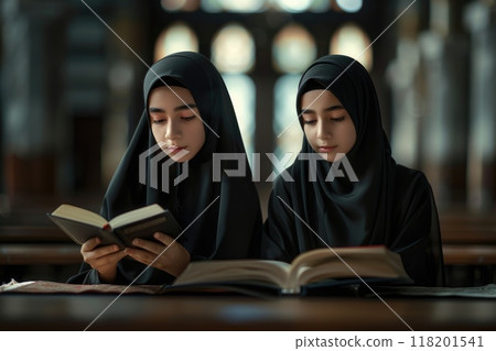 Spiritual devotion - islamic person with Koran, deep reverence, connection to faith, serene moment of reading and reflecting on holy text, significance of religious practice in daily life. 118201541