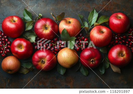 Apples and pomegranate seeds on a dark background. Traditional Jewish cuisine for the New Year holiday - Rosh Hashanah 118201897