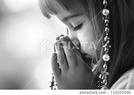 Sacred milestone - capturing the essence of first communion in a tender and symbolic portrayal, where young believers embrace the solemnity and spirituality of this significant rite Sacred milestone - capturing the essence of first communion in a tender and symbolic portrayal, where young believers embrace the solemnity and spirituality of this significant rite 118202096