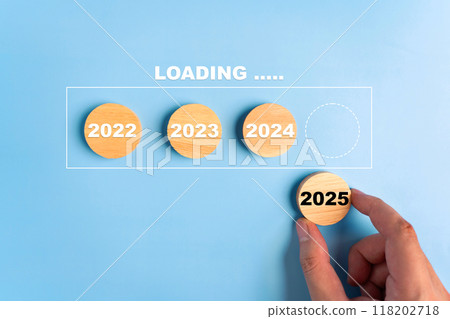 Man hand is using wooden blocks with the word 2025 to fill in the year section. 2025 New Year concept. 118202718