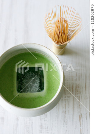 Cup of fresh matcha tea, green tea on white wooden table. 118202979