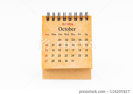 Brown mini desk calendar for October 2024 isolated on white. Brown mini desk calendar for October 2024 isolated on white. 118205927