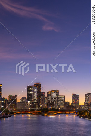 Beautiful scenery of Nakanoshima seen from Tenmabashi Bridge - Magic Hour 118206540