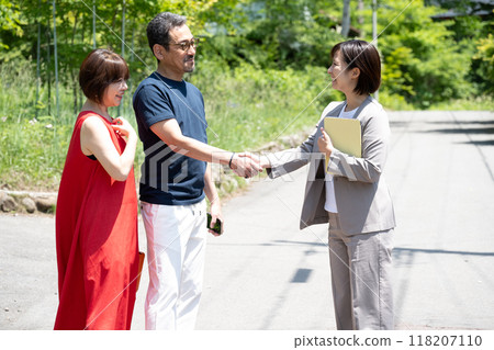 A couple touring a villa A couple touring a villa 118207110