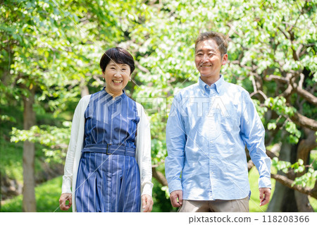 Senior couple taking a walk on a sunny day 118208366