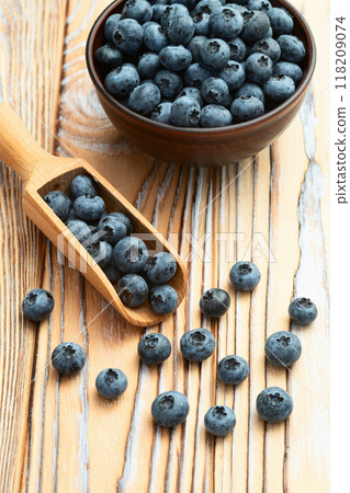 Blueberry photography in a bowl on rustic background Blueberry photography in a bowl on rustic background 118209074