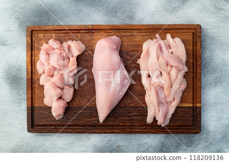 Raw chicken meat fillet ( breast ) Various of cutting in form slice and cube Raw chicken meat fillet ( breast ) Various of cutting in form slice and cube 118209136