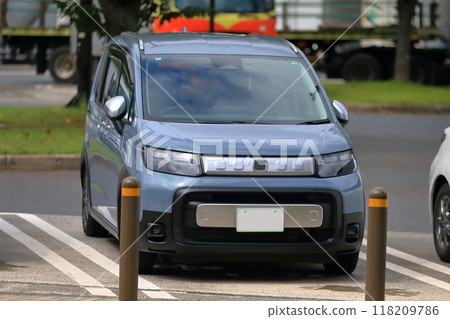 Parked minivan 118209786