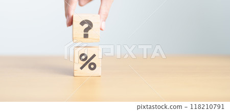 wood block of Question mark and Percentage. Interest rate, GDP, stocks market, financial, deflation and Inflation, ranking, mortgage, debt, Loan and Economic Recession 118210791