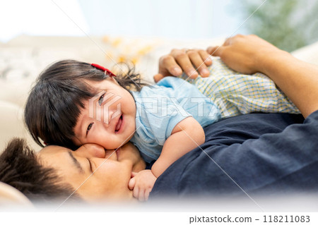 portrait of a baby girl 118211083
