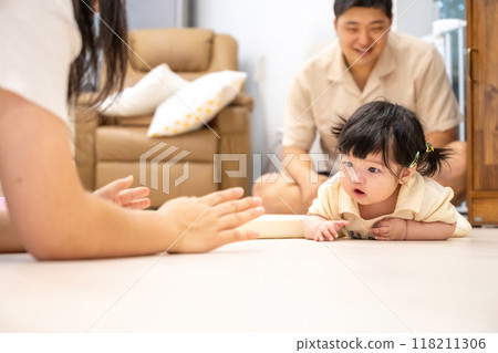 portrait of a baby girl 118211306