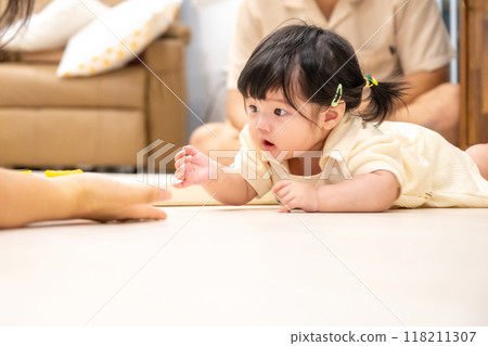 portrait of a baby girl 118211307