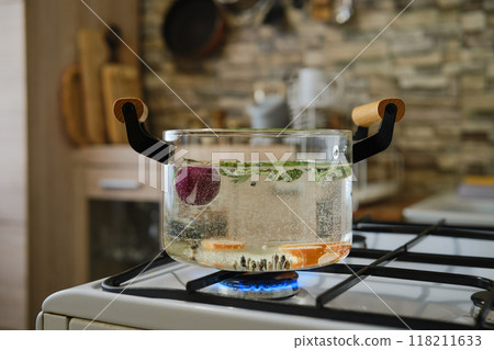 Water boiling in transparent saucepan Water boiling in transparent saucepan 118211633