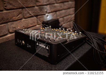 Audio mixing console in the recording studio. Selective focus. Shallow depth of field Audio mixing console in the recording studio. Selective focus. Shallow depth of field 118212155