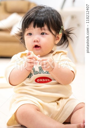 portrait of a baby girl 118212407