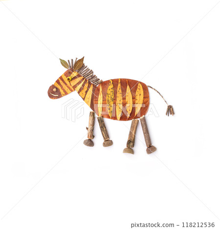 a close up of autumn dry leaves craft zebra, folk art, foliage, project for kids 118212536