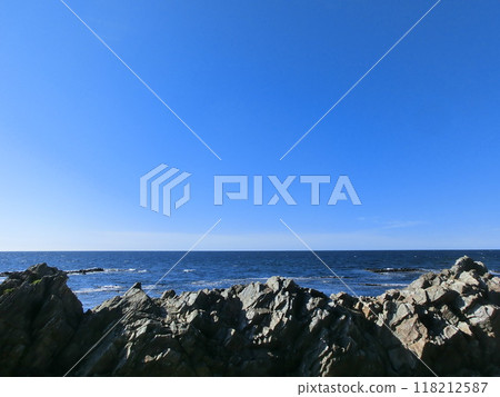 Rocky coast and blue sky Rocky coast and blue sky 118212587