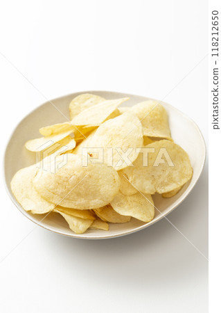 Potato chips on white background Potato chips on white background 118212650