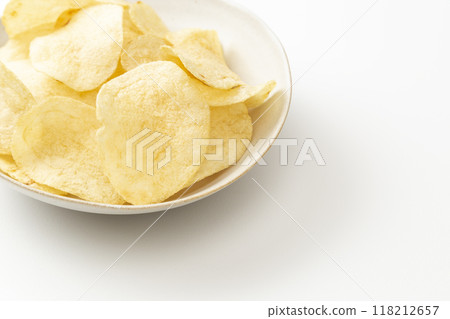 Potato chips on white background Potato chips on white background 118212657