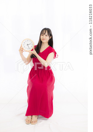 young woman in red dress young woman in red dress 118216033