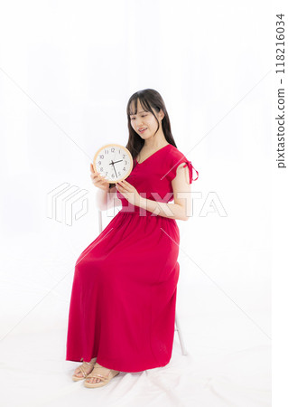 young woman in red dress young woman in red dress 118216034