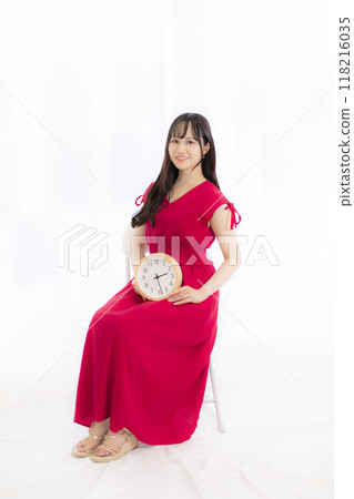 young woman in red dress young woman in red dress 118216035