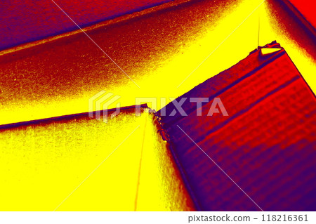 Empty open cardboard box, changed colors, bright background in pastel colors. 118216361