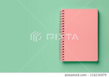 Pink Notebook. Spiral notepad on sage mute green color studio background. Top view. Open pad with blank white page. Greeting card mockup. Paper mock up. Modern Minimal business brand template. A6 118216979