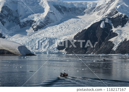 Tourists watching a glacier in Antarctica, near the Antarctic Peninsula. 118217167