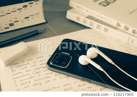 Smartphone and earphones Online learning Learning English with your smartphone 118217905