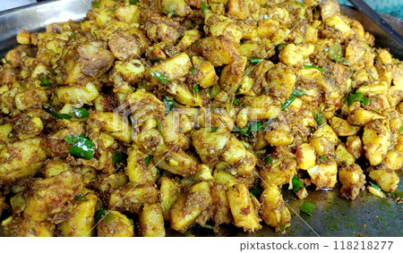 Stall of spicy dry potato vegetable in an Indian market Stall of spicy dry potato vegetable in an Indian market 118218277