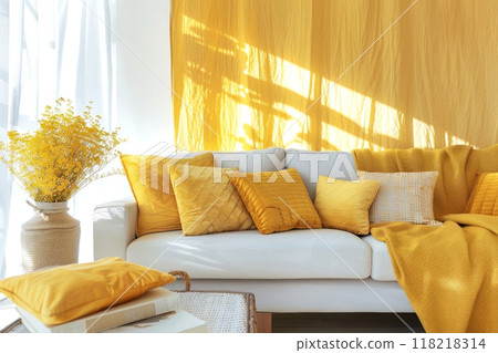 Brighten your space with this cozy chic living room scene, featuring plush yellow pillows 118218314