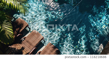 Elevate your summer vibes with this tranquil poolside view captured in stunning clarity. 118218686