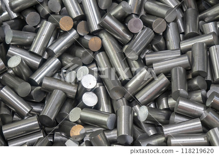 The pile of raw material metal rod ingot. The pile of raw material metal rod ingot. 118219620