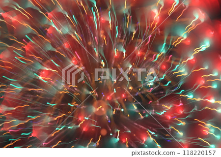 Image of fireworks lighting up the night sky 118220157