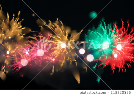 Image of fireworks lighting up the night sky 118220556