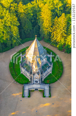 The striking Schwarzenberg Tomb in Domanin showcases intricate architecture set in a serene wooded landscape, highlighting its historical significance and picturesque surroundings near Trebon. 118220587