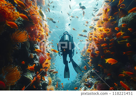 Professional diving, scuba diver in the depths of water with cylinders among colorful fish, corals and stones. Professional diving, scuba diver in the depths of water with cylinders among colorful fish, corals and stones. 118221451