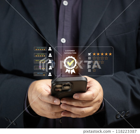 Man rates satisfaction using smartphone via virtual screen. Concept of service satisfaction, survey, five star rating, highest satisfaction. Success business, quality service, survey feedback. Man rates satisfaction using smartphone via virtual screen. Concept of service satisfaction, survey, five star rating, highest satisfaction. Success business, quality service, survey feedback. 118223387