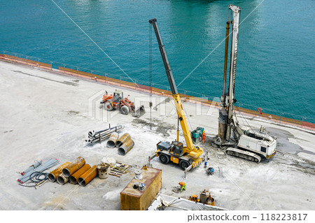 Installation of pile casings in the port quay, drilling rig, port infrastructure upgrade works 118223817