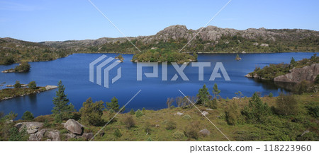 Beautiful Lake Fossvatnet and anorthosite rock formations in late summer, Egersund, Norway. 118223960