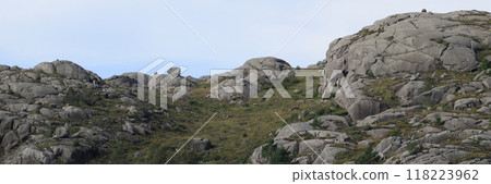 Anorthosite rock mountain and boulder near Egersund, Norway. Anorthosite rock mountain and boulder near Egersund, Norway. 118223962