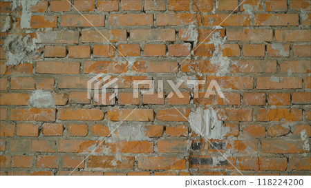 Brick ready to build house wall in a construction site. Brick wall, masonry, ready for repair. 118224200