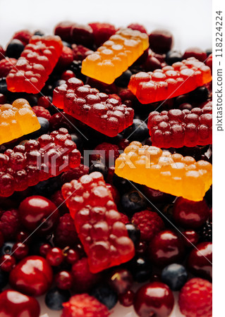 Colorful natural berry marmalade on fresh mixed fruits and berries, healthy sweet indulgence Colorful natural berry marmalade on fresh mixed fruits and berries, healthy sweet indulgence 118224224